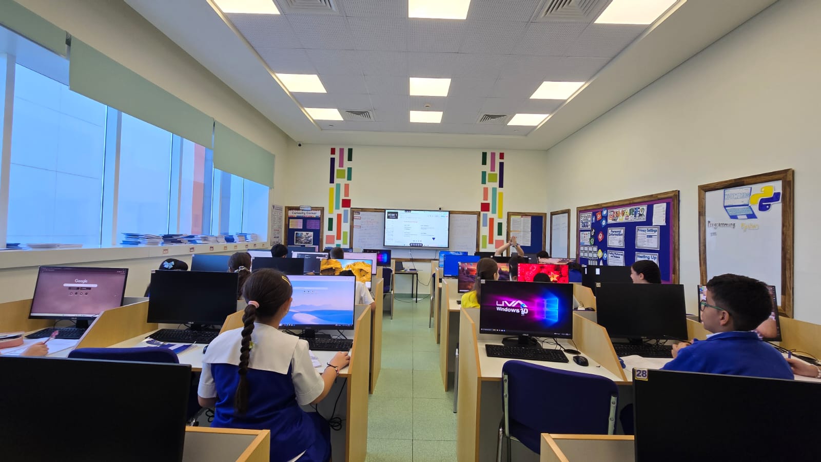 Computer Science Lab classroom with students at workstations